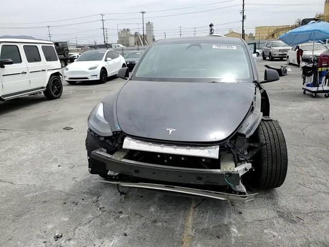 2024 Tesla Model Y VIN: 7SAYGDEEXRF180874 Lot: 70837325