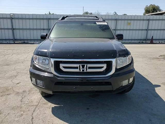 2011 Honda Ridgeline Rtl VIN: 5FPYK1F54BB004778 Lot: 68395475