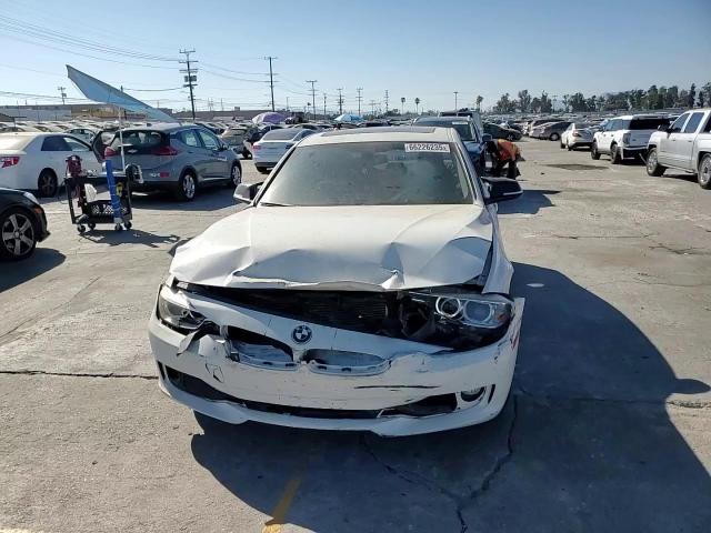 2014 BMW 320 I VIN: WBA3B1C50EP679302 Lot: 66226235