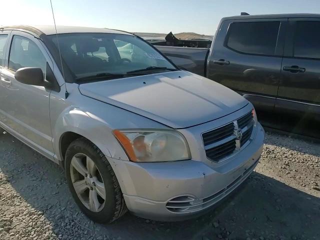 2010 Dodge Caliber Sxt VIN: 1B3CB4HA4AD592185 Lot: 67870375