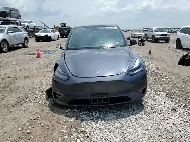 2023 Tesla Model Y VIN: 7SAYGDEE5PA174653 Lot: 69120075