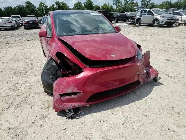 2023 Tesla Model Y VIN: 7SAYGAEE6PF630449 Lot: 70827215