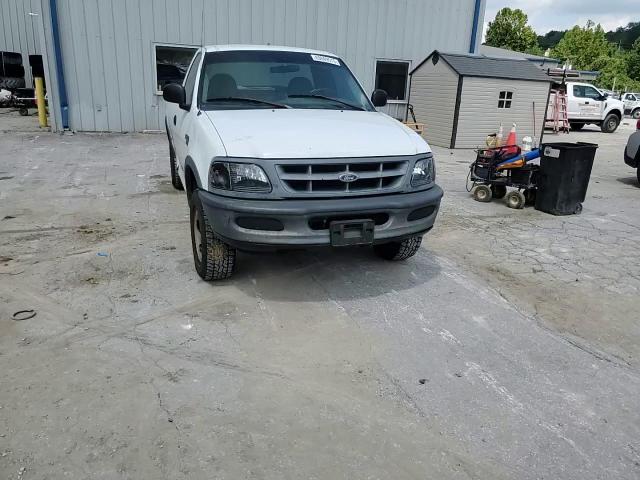 1998 Ford F150 VIN: 1FTRF18LXWNC26522 Lot: 69669515