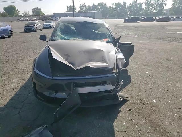 2026 Tesla Model Y VIN: 7SAYGDEE5TF366779 Lot: 67306005