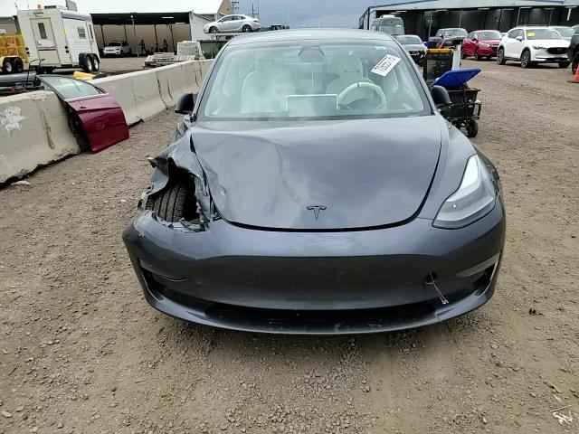 2021 Tesla Model 3 VIN: 5YJ3E1EB0MF037975 Lot: 70655775