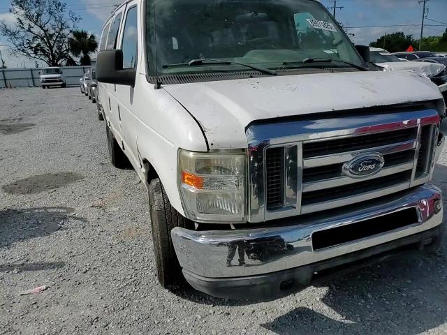 2009 Ford Econoline E350 Super Duty Wagon VIN: 1FBSS31L59DA27184 Lot: 69574325