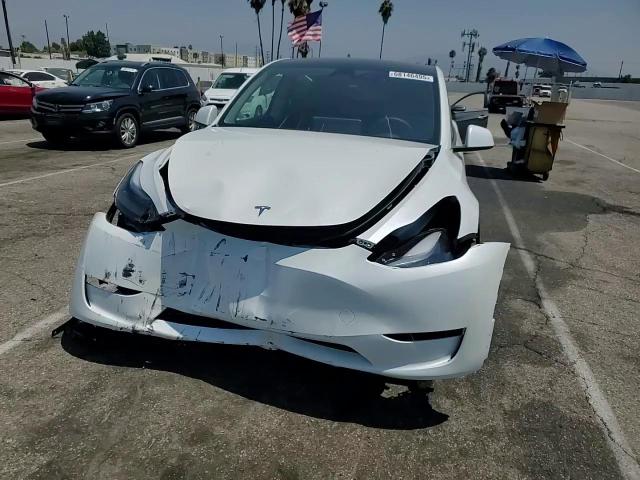 2025 Tesla Model Y VIN: 7SAYGDED7SF321638 Lot: 68146495