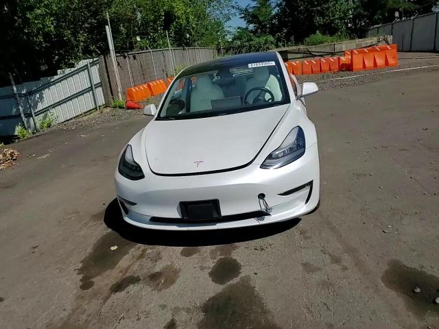 2019 Tesla Model 3 VIN: 5YJ3E1EBXKF213928 Lot: 67633505