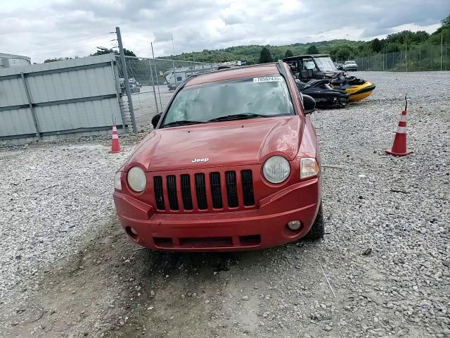 2010 Jeep Compass VIN: 1J4NT4FB7AD601911 Lot: 70562435