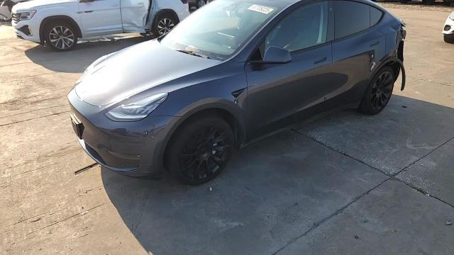 2023 Tesla Model Y VIN: 7SAYGDEE9PA044097 Lot: 67709225