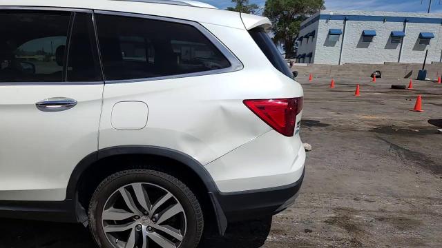 2018 Honda Pilot Touring VIN: 5FNYF6H98JB054611 Lot: 70558255