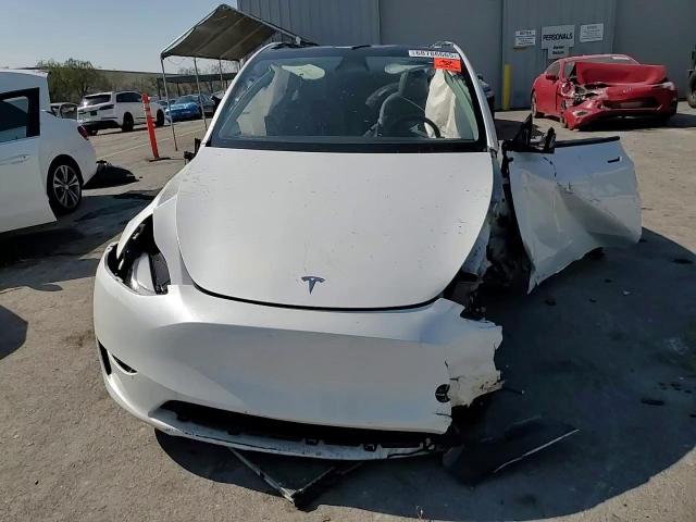 2024 Tesla Model Y VIN: 7SAYGDED1RF121719 Lot: 68786665