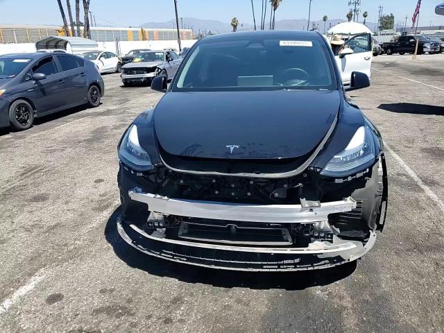 2023 Tesla Model Y VIN: 7SAYGDEE2PA149273 Lot: 69108205