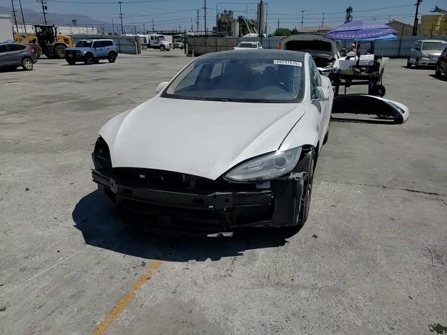 2014 Tesla Model S VIN: 5YJSA1H11EFP65476 Lot: 69247515