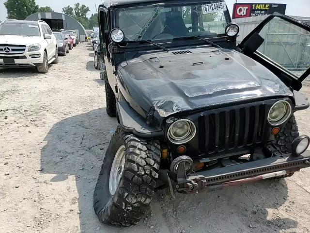 1998 Jeep Wrangler / Tj Sahara VIN: 1J4FY49S9WP701399 Lot: 67124945