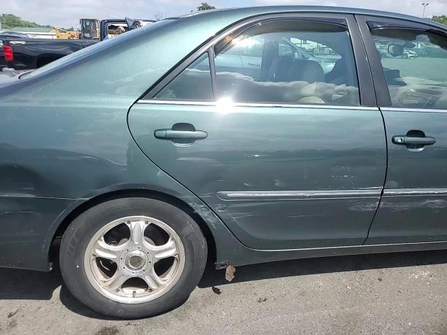 2004 Toyota Camry Le VIN: 4T1BF30K74U077548 Lot: 68112775