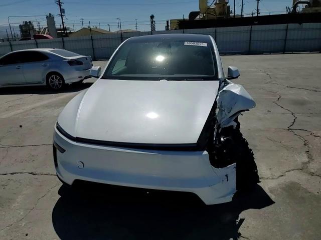 2026 Tesla Model Y VIN: 7SAYGDED3TF404582 Lot: 69503095