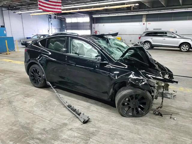 2023 Tesla Model Y VIN: 7SAYGDEE1PF694769 Lot: 68747105