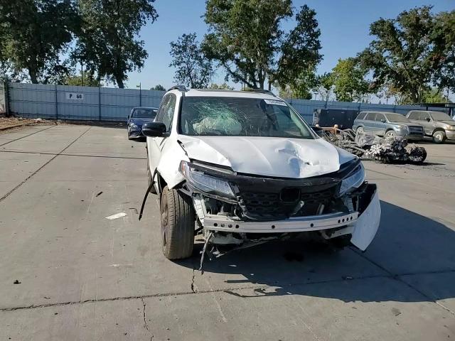 2021 Honda Passport Elite VIN: 5FNYF8H08MB037258 Lot: 70494095