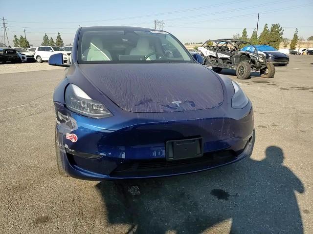2023 Tesla Model Y VIN: 7SAYGDEE2PF889327 Lot: 68185365