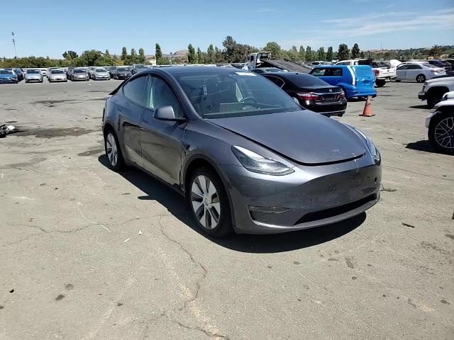 2023 Tesla Model Y VIN: 7SAYGDEE5PF885711 Lot: 67995995