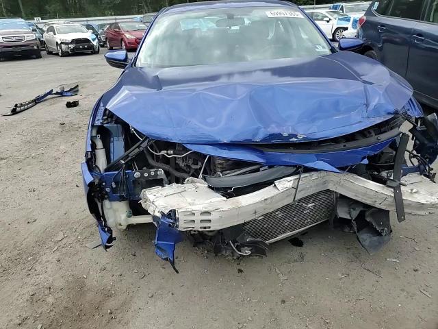 2018 Honda Civic Lx VIN: 19XFC2F51JE011033 Lot: 69997365