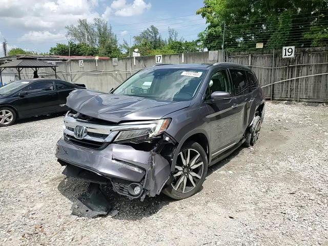 2021 Honda Pilot Touring VIN: 5FNYF5H95MB011570 Lot: 70447465