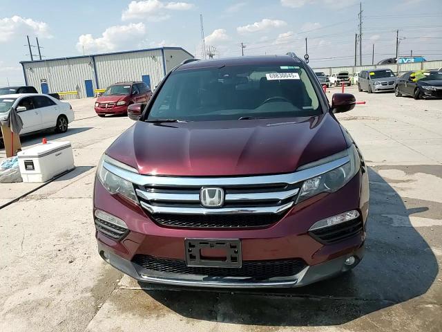 2018 Honda Pilot Elite VIN: 5FNYF6H04JB068202 Lot: 69830045