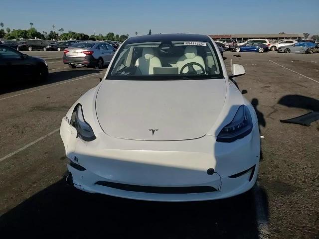 2023 Tesla Model Y VIN: 7SAYGDEE6PA156615 Lot: 69411224