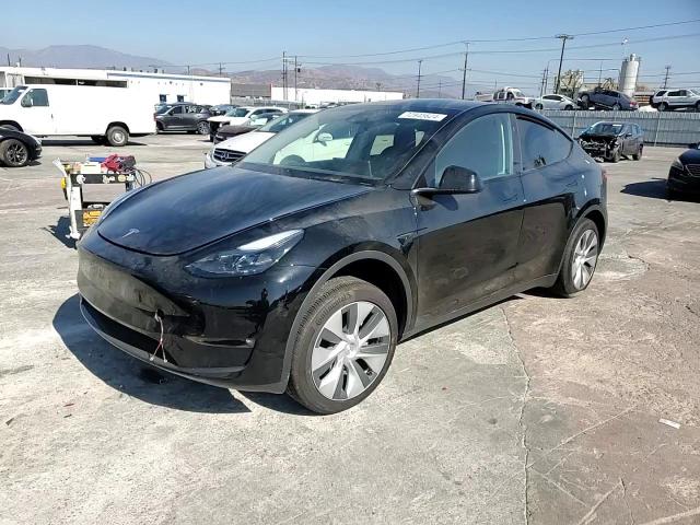 2023 Tesla Model Y VIN: 7SAYGDED1PF979477 Lot: 72945624