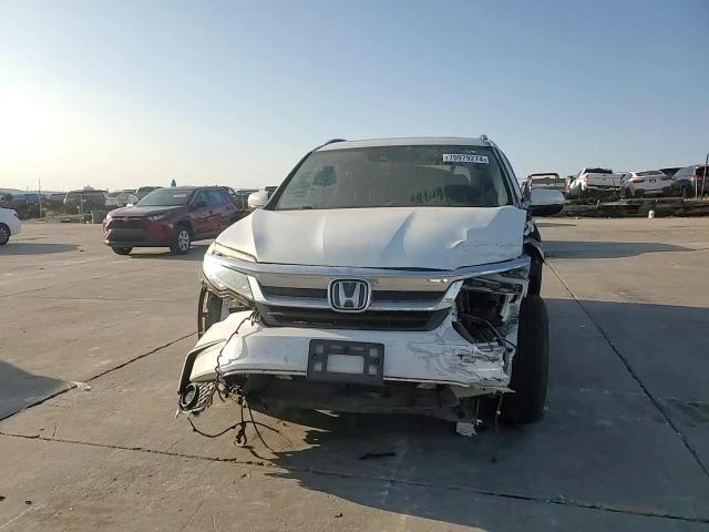 2020 Honda Pilot Touring VIN: 5FNYF5H97LB009821 Lot: 70979274