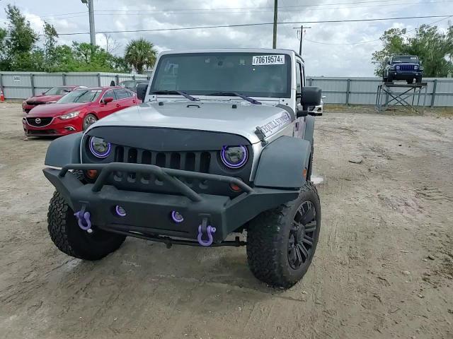 2010 Jeep Wrangler Unlimited Sport VIN: 1J4BA3H15AL185418 Lot: 70619574