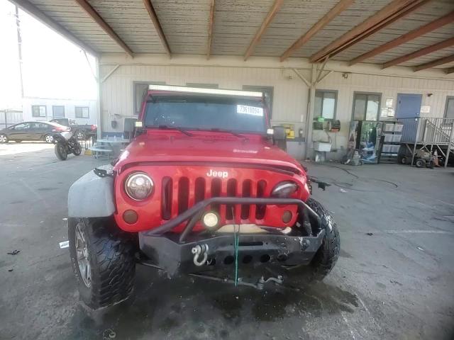 2011 Jeep Wrangler Rubicon VIN: 1J4HA6D18BL521856 Lot: 73618094