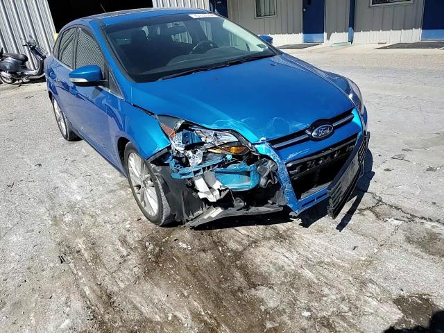 2014 Ford Focus Titanium VIN: 1FADP3J20EL450211 Lot: 70139344