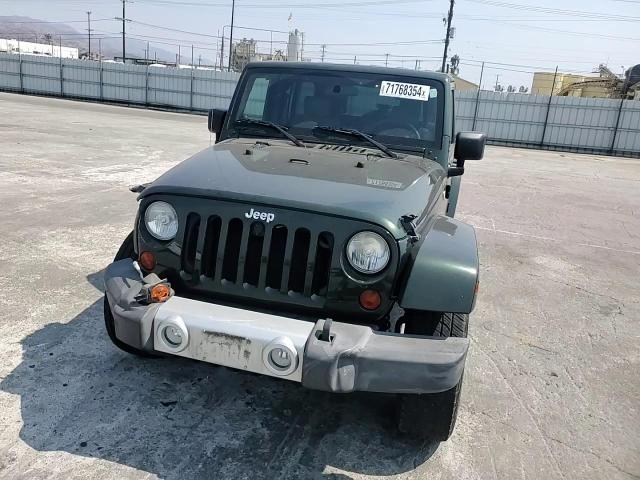 2010 Jeep Wrangler Unlimited Sahara VIN: 1J4BA5H18AL197199 Lot: 71768354