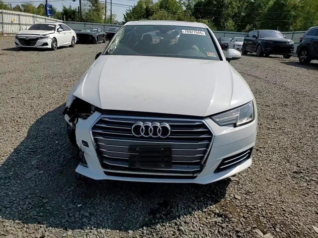 2017 Audi A4 Premium VIN: WAUGNAF49HN028553 Lot: 70921544