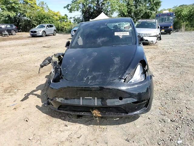 2023 Tesla Model Y VIN: 7SAYGDEE4PF691672 Lot: 72264044