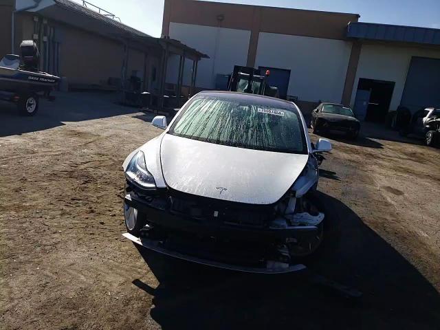 2018 Tesla Model 3 VIN: 5YJ3E1EA1JF164754 Lot: 70007454