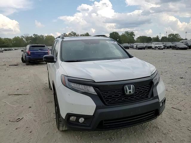 2021 Honda Passport Elite VIN: 5FNYF8H03MB014714 Lot: 70297284