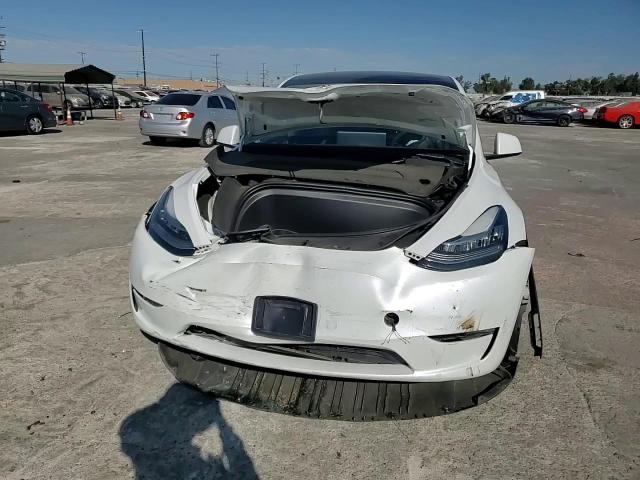 2023 Tesla Model Y VIN: 7SAYGDEE1PA115891 Lot: 70822134