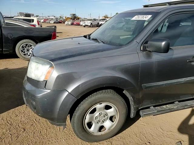 2011 Honda Pilot Lx VIN: 5FNYF4H25BB063615 Lot: 72623634