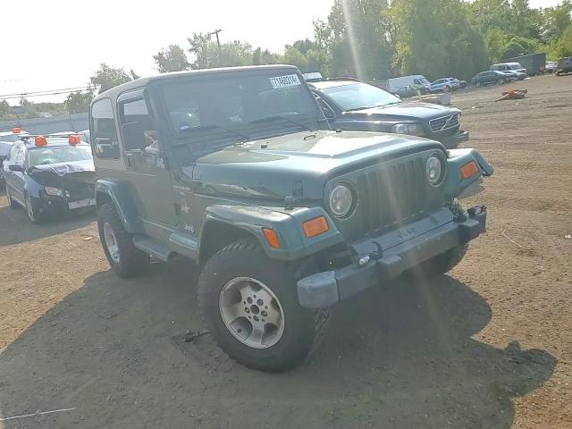 1999 Jeep Wrangler / Tj Sahara VIN: 1J4FY49S2XP496784 Lot: 71460314