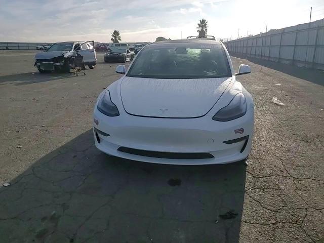 2021 Tesla Model 3 VIN: 5YJ3E1EA1MF070734 Lot: 72175704