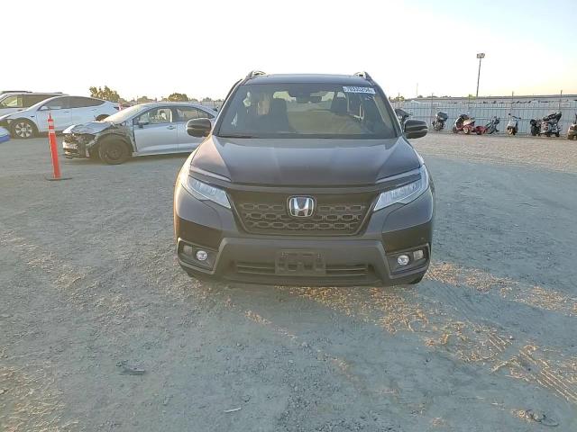 2019 Honda Passport Touring VIN: 5FNYF8H99KB000828 Lot: 70335254