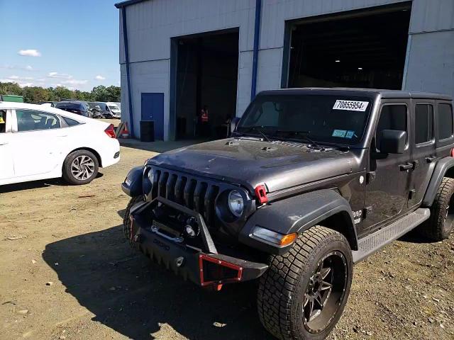 1C4HJXDN2KW618869 2019 Jeep Wrangler Unlimited Sport