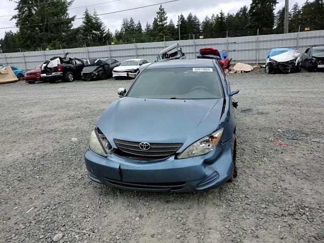 2003 Toyota Camry Le VIN: 4T1BE32K83U725316 Lot: 69979084