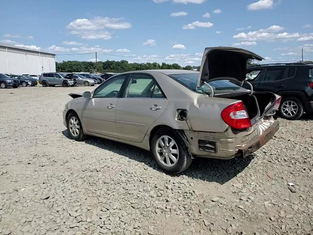 2004 Toyota Camry Le VIN: 4T1BE30KX4U900623 Lot: 70184484