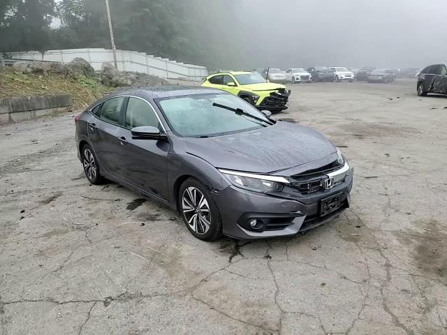 2018 Honda Civic Ex VIN: JHMFC1F35JX010359 Lot: 70298594