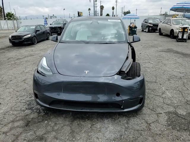 2023 Tesla Model Y VIN: 7SAYGDEE1PF899301 Lot: 72255244