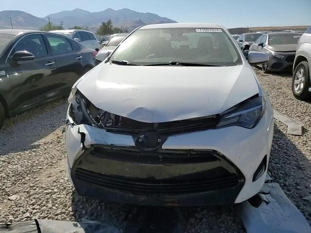 2017 Toyota Corolla L VIN: 5YFBURHE7HP659017 Lot: 71607974